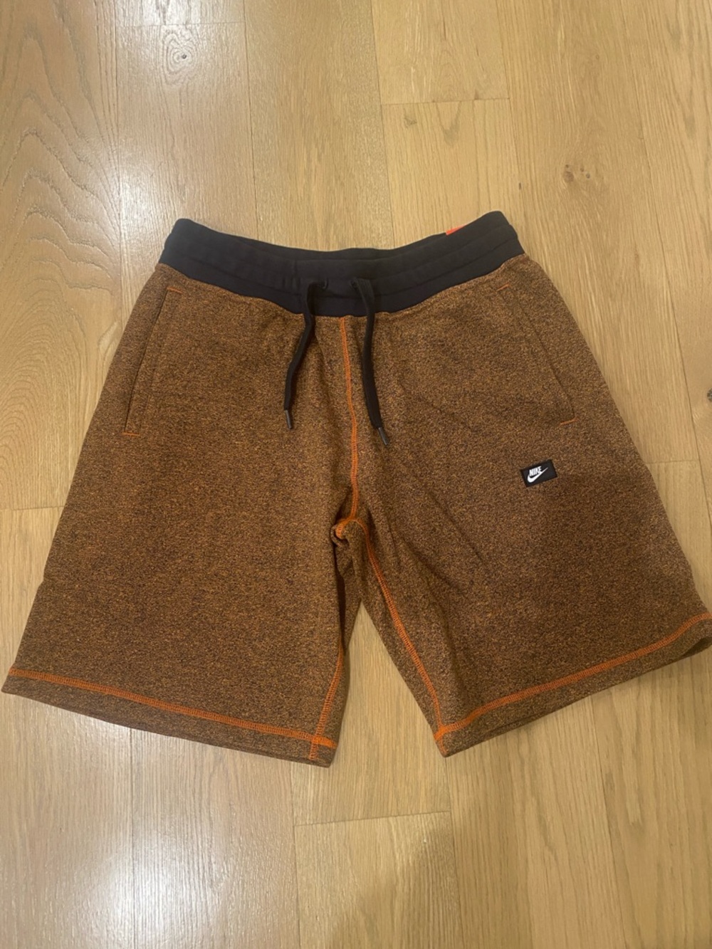 Nike Men's Heathered Orange Athletic Shorts with Black Waistband